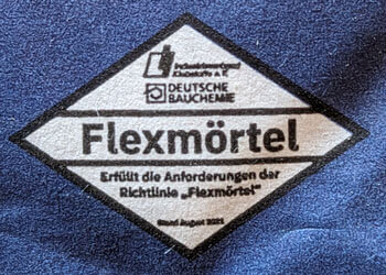 Flexmörtel-Raute als Kennzeichnung für Flexkleber